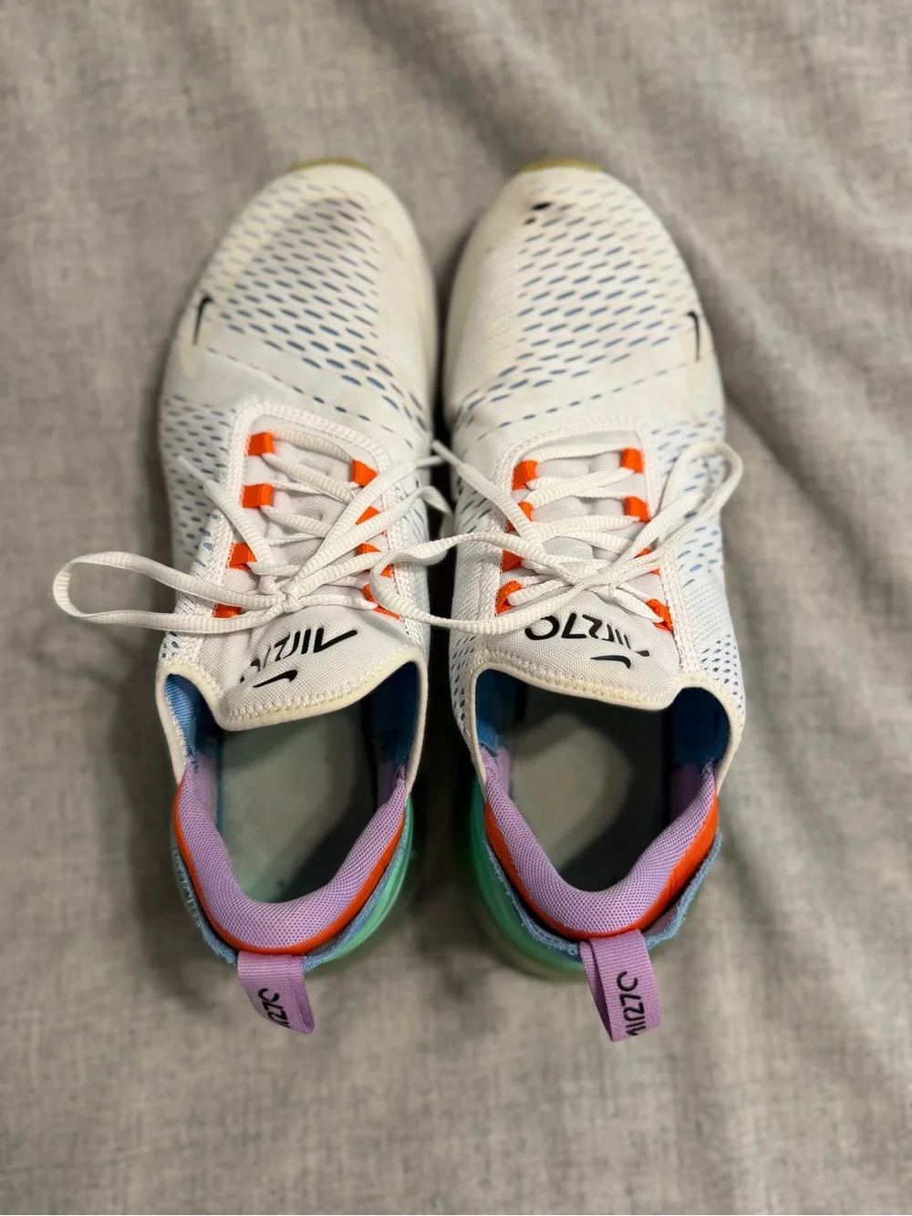 Nike White Running Sneakers with Orange Accents and Purple Lining